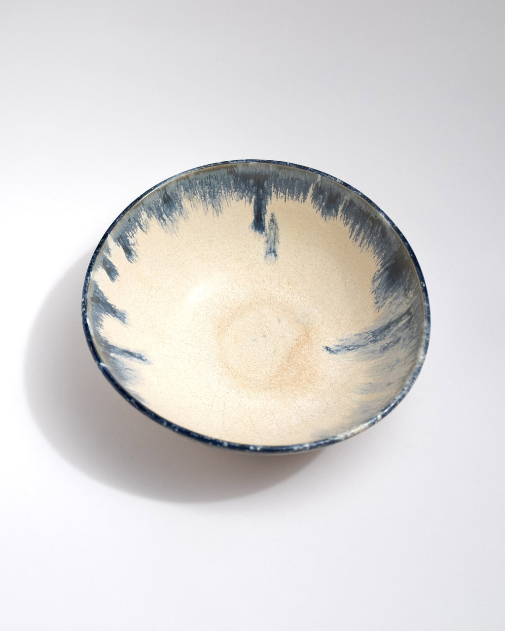 Ceramic bowl with blue and white design
