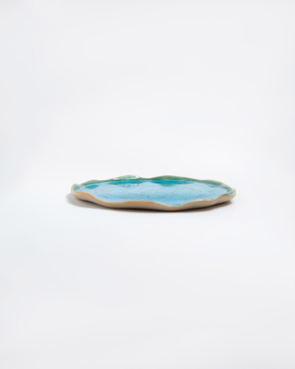 Ceramic handmade dish with blue interior
