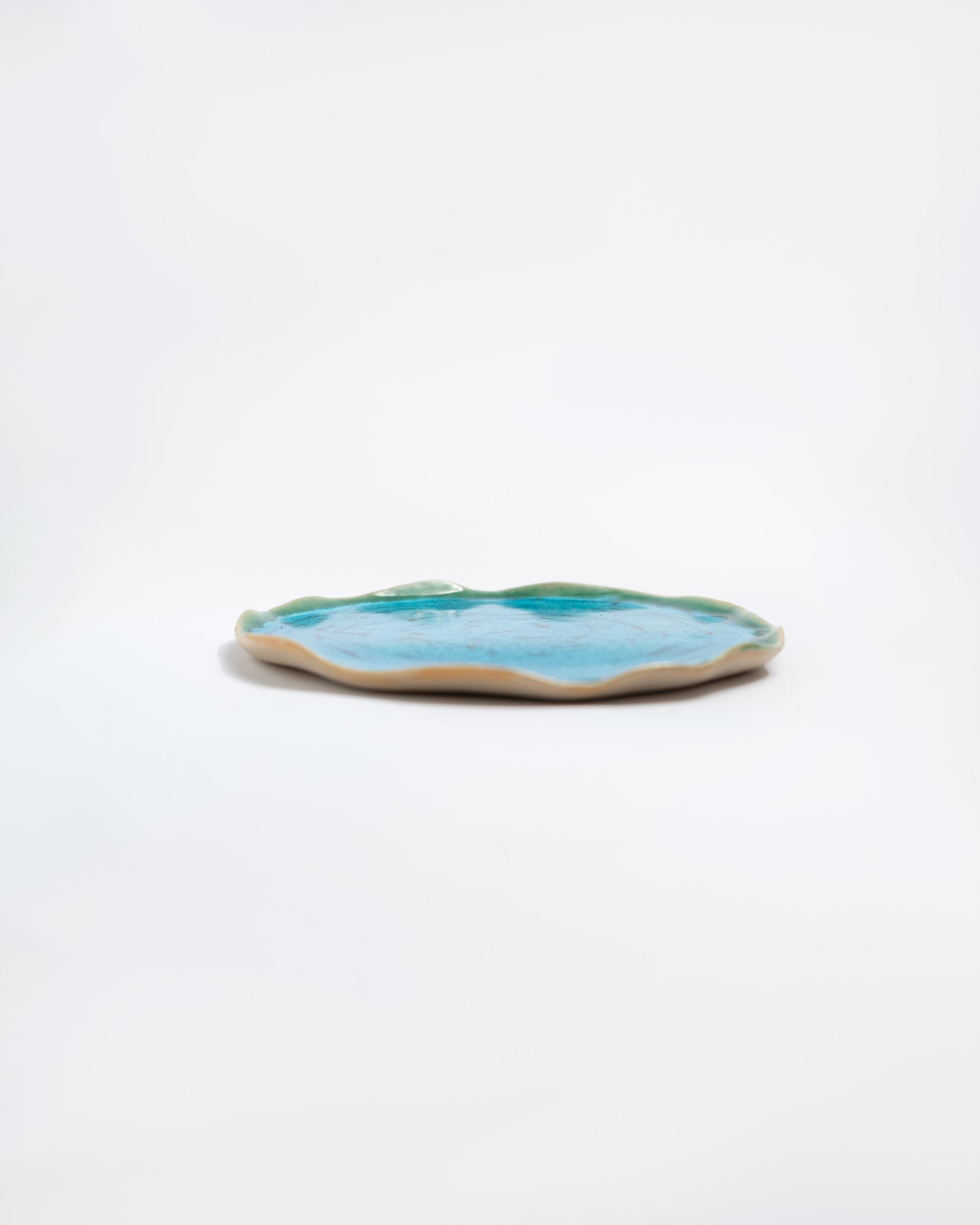 Ceramic handmade dish with blue interior