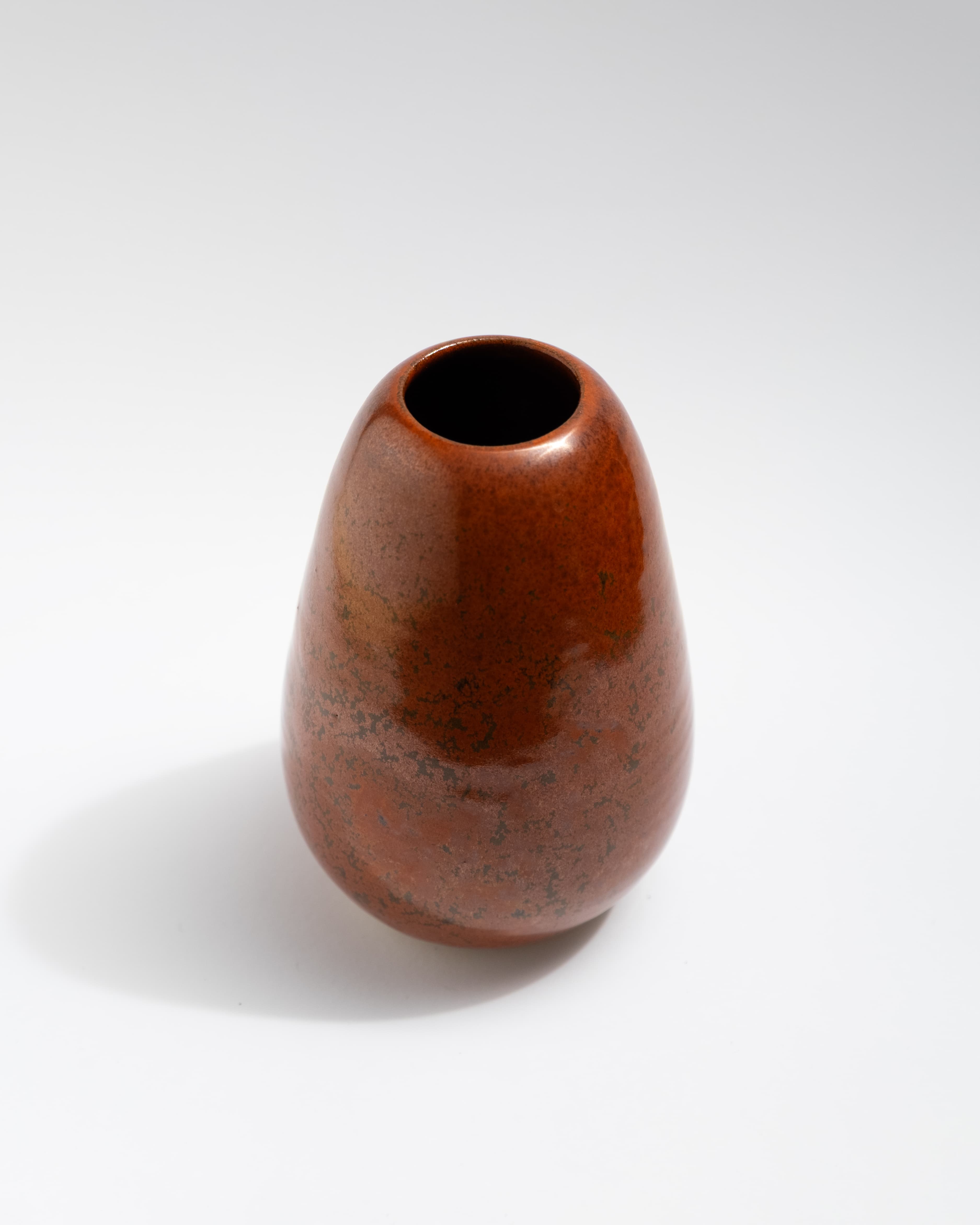 Brown ceramic vase on a white background