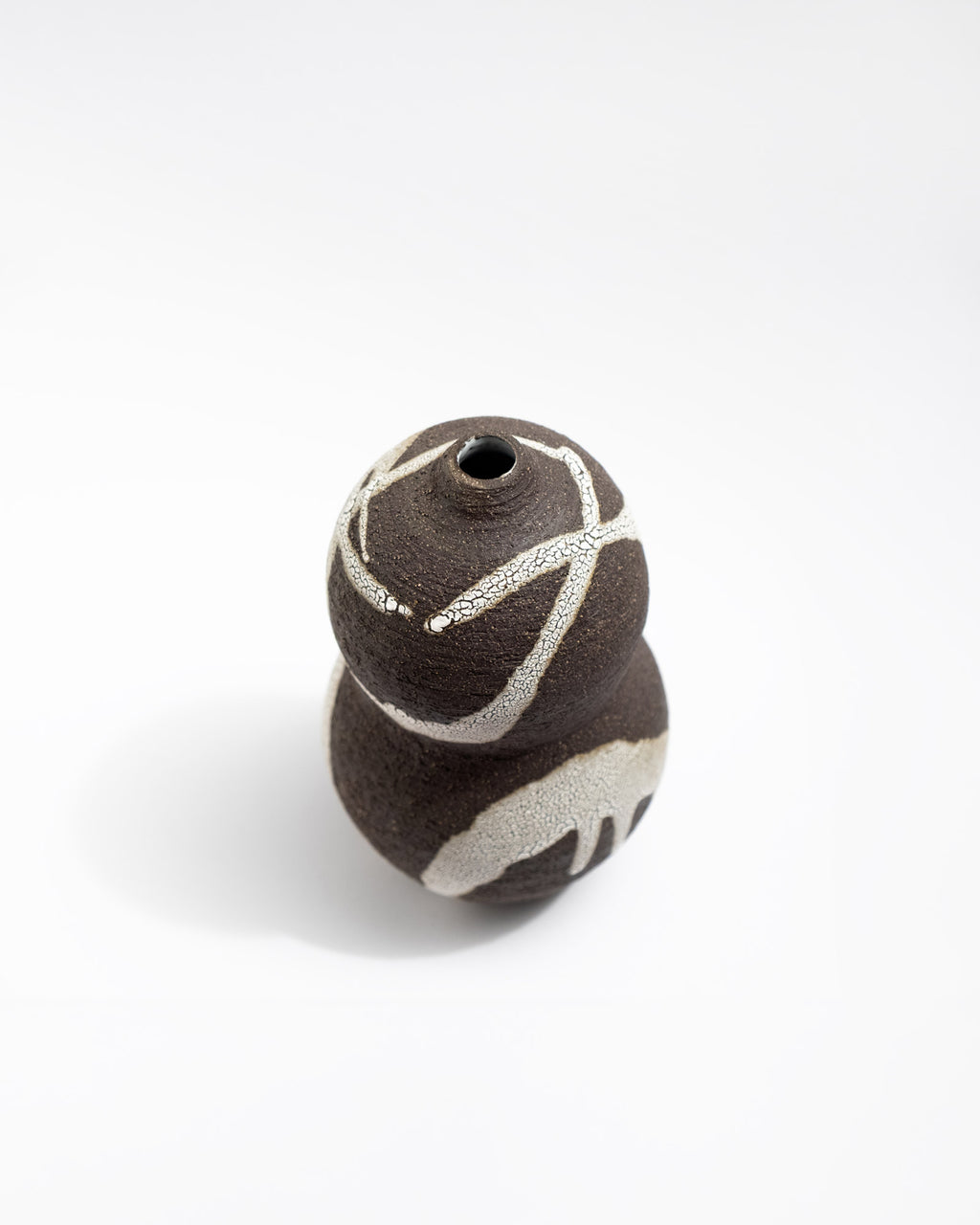 Ceramic black vase on a white background