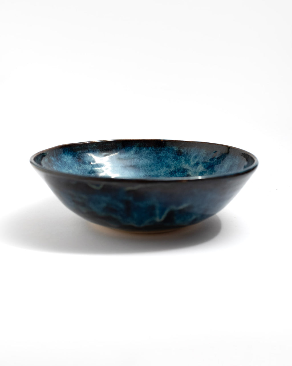 Ceramic bowl with blue and black glaze, handmade in Italy