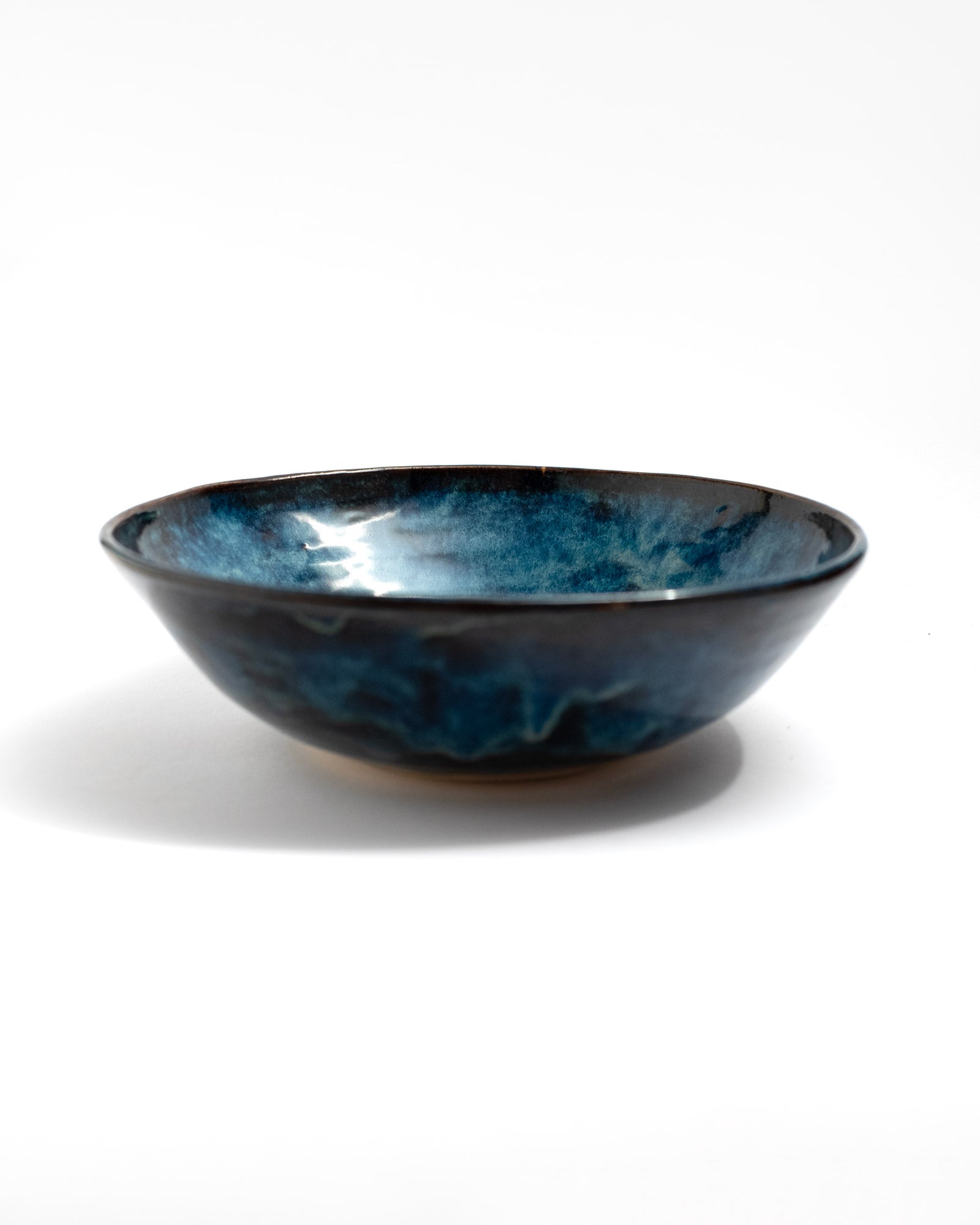 Ceramic bowl with blue and black glaze, handmade in Italy