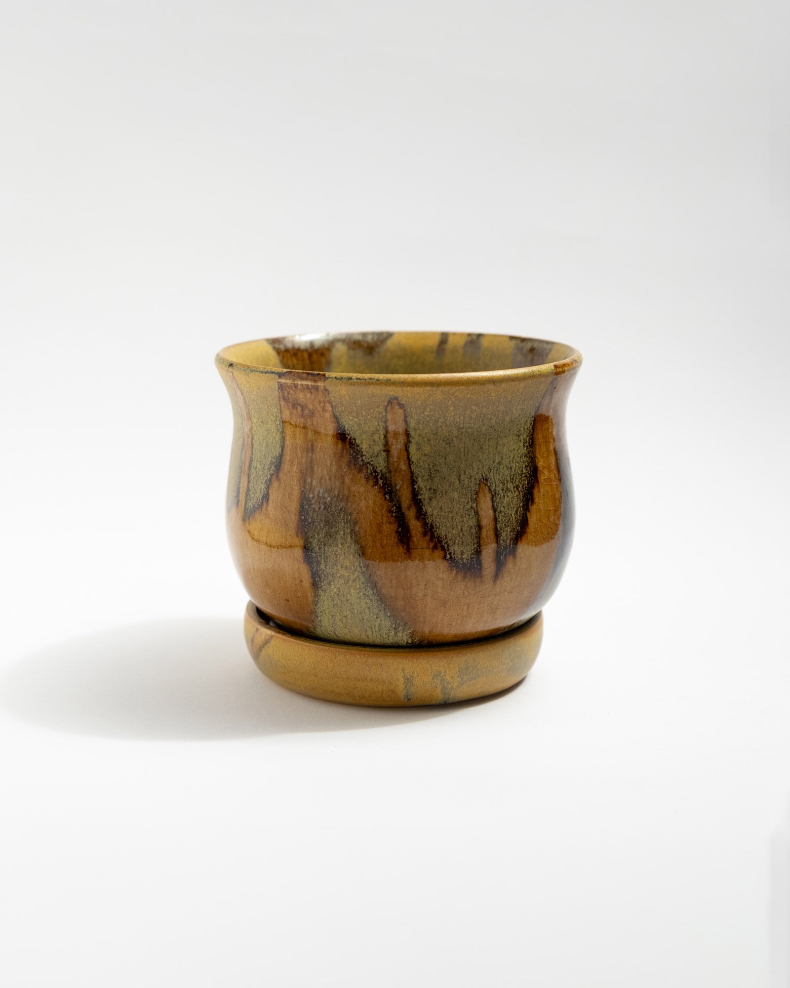 Ceramic planter with brown and beige glaze on a white background, handmade in Italy