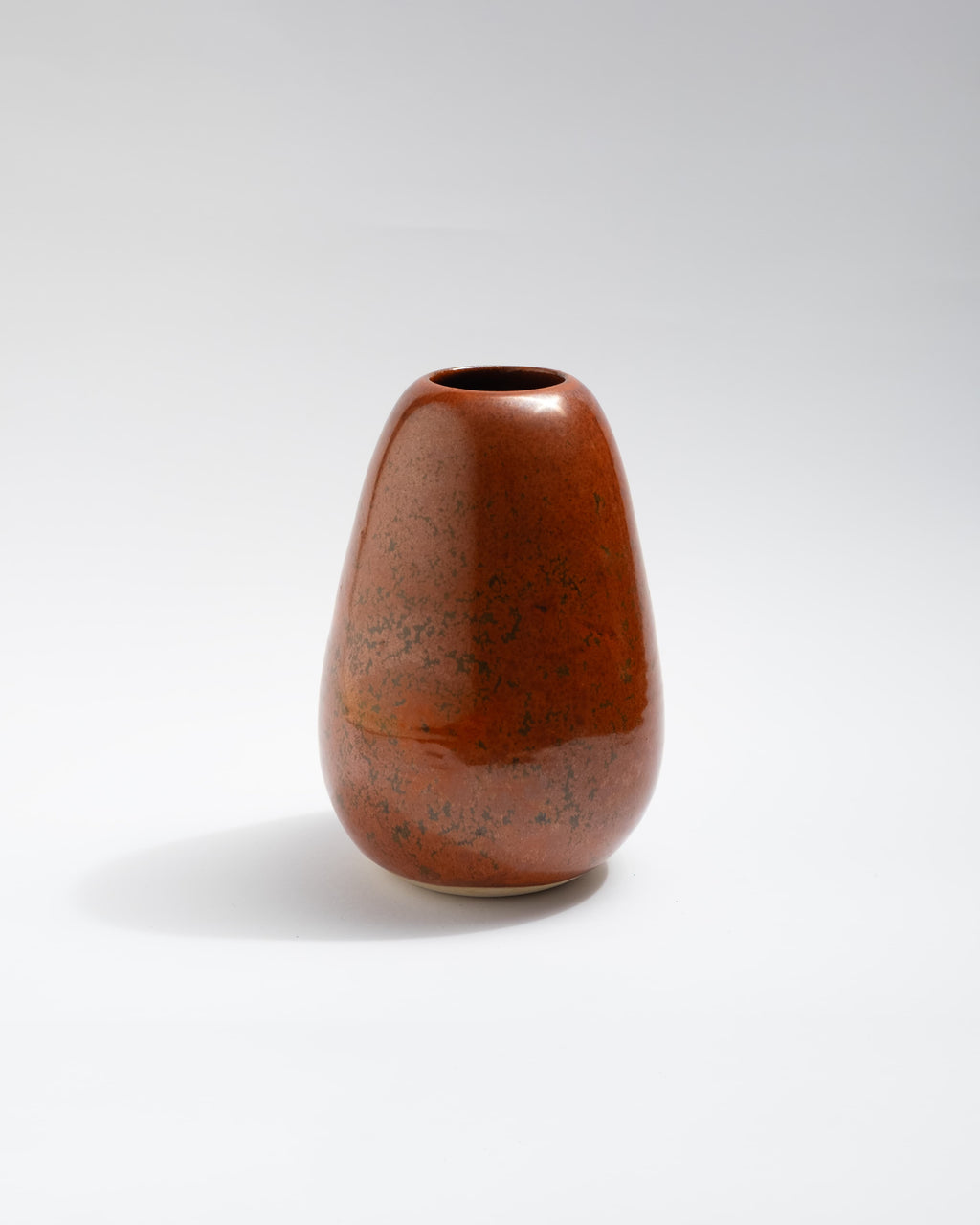 Brown red ceramic vase on a white background, made in Italy