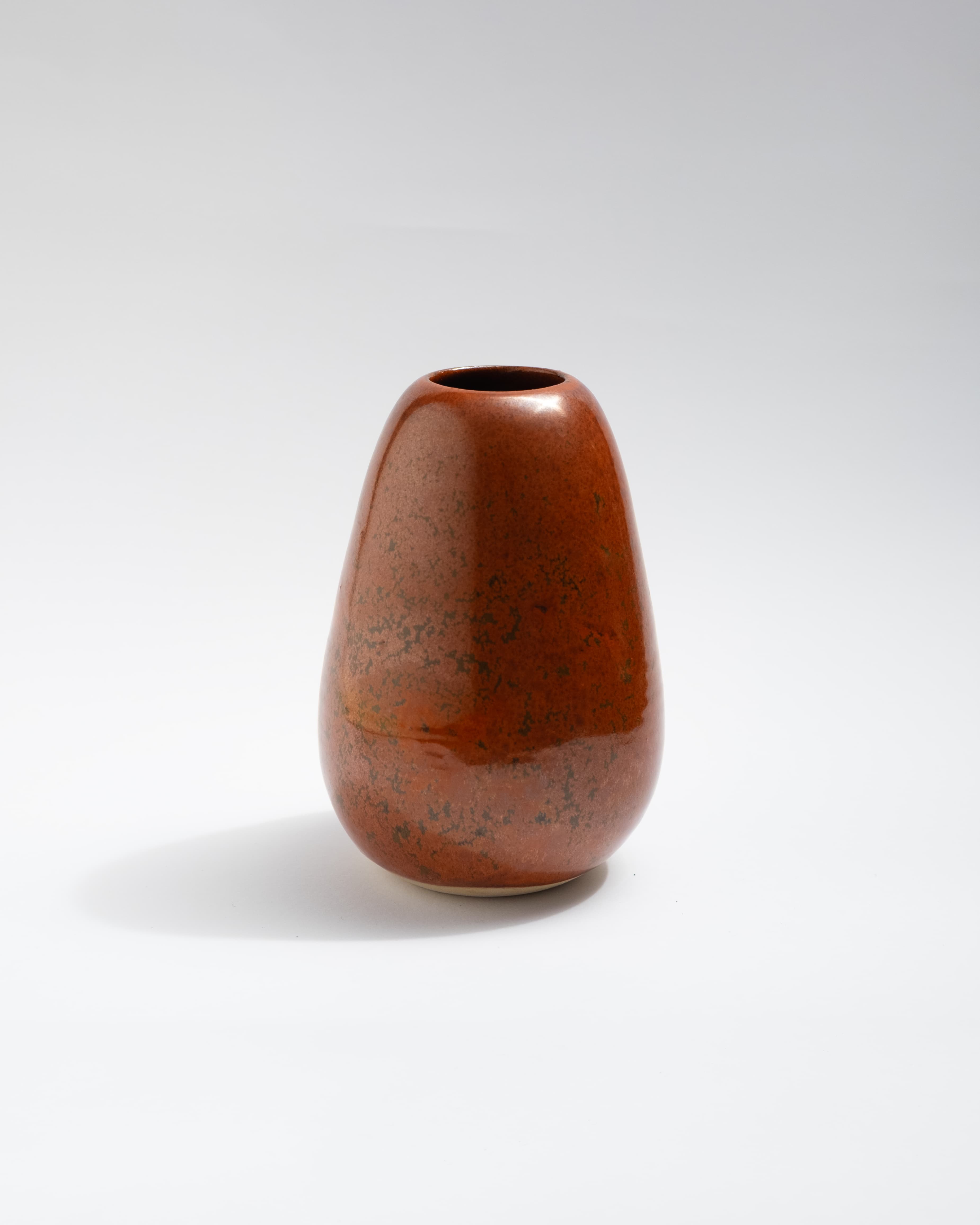 Brown red ceramic vase on a white background, made in Italy