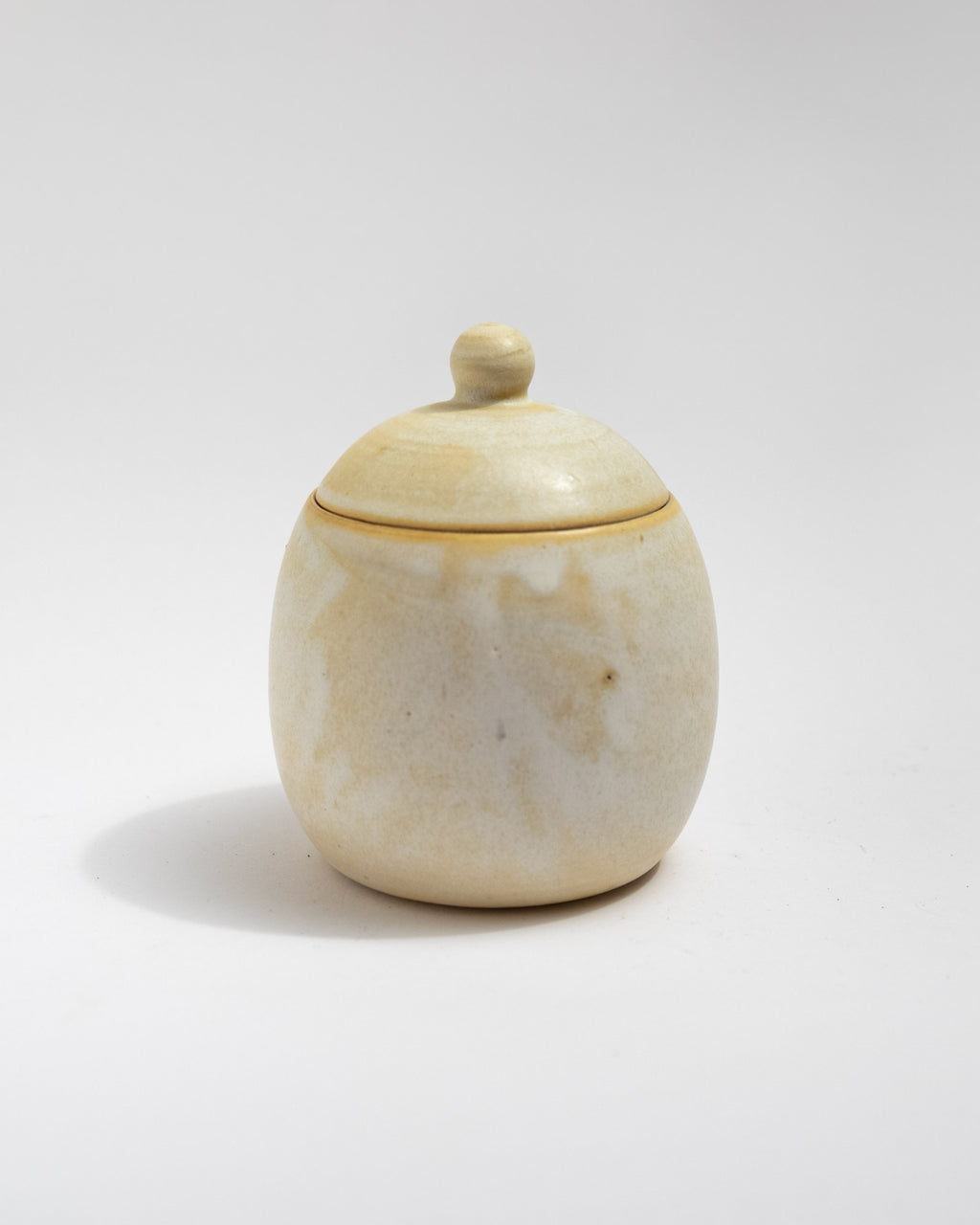 White ceramic jar with lid, handmade in Italy