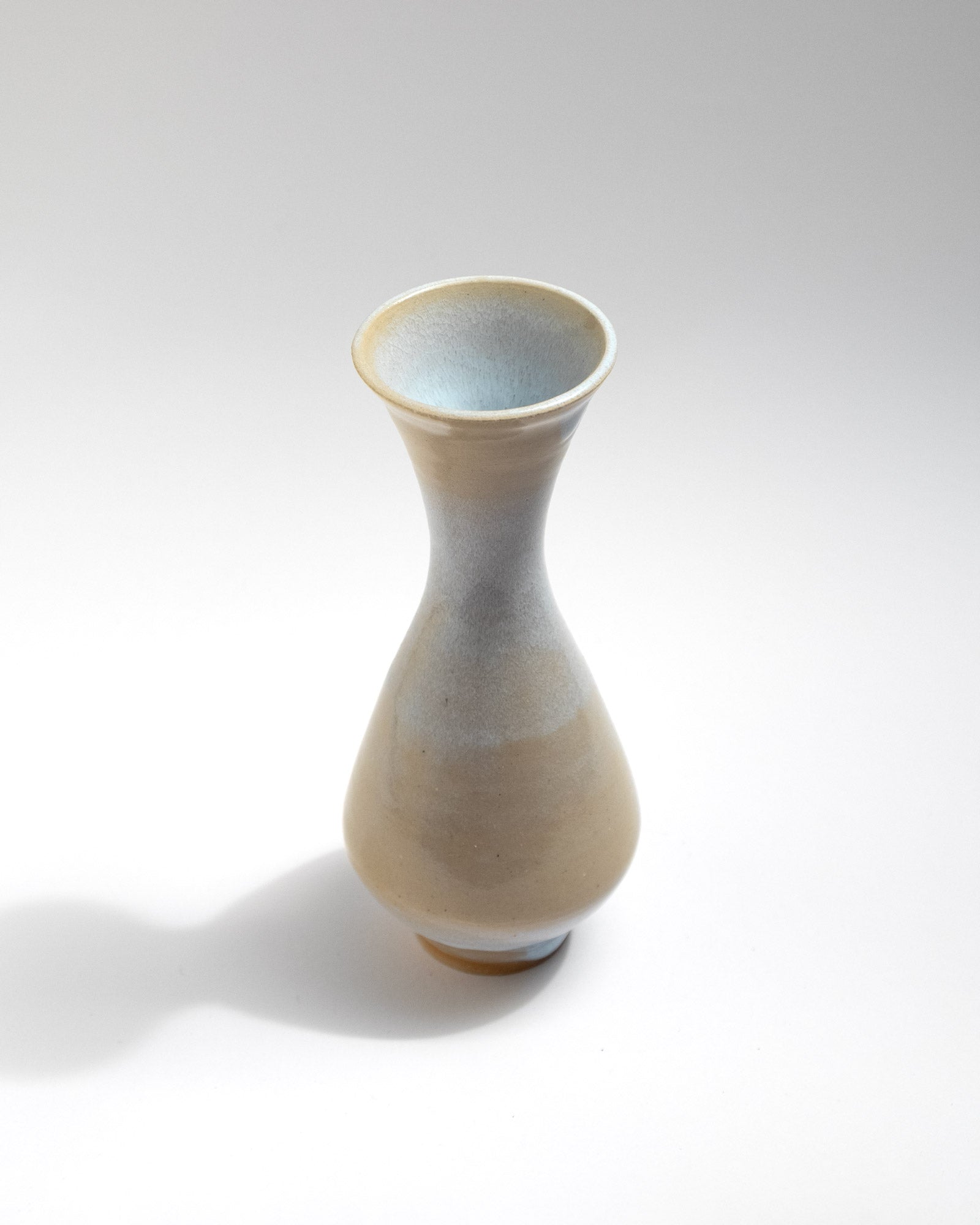 Handmade ceramic vase with pale sand and soft grey gradient glaze