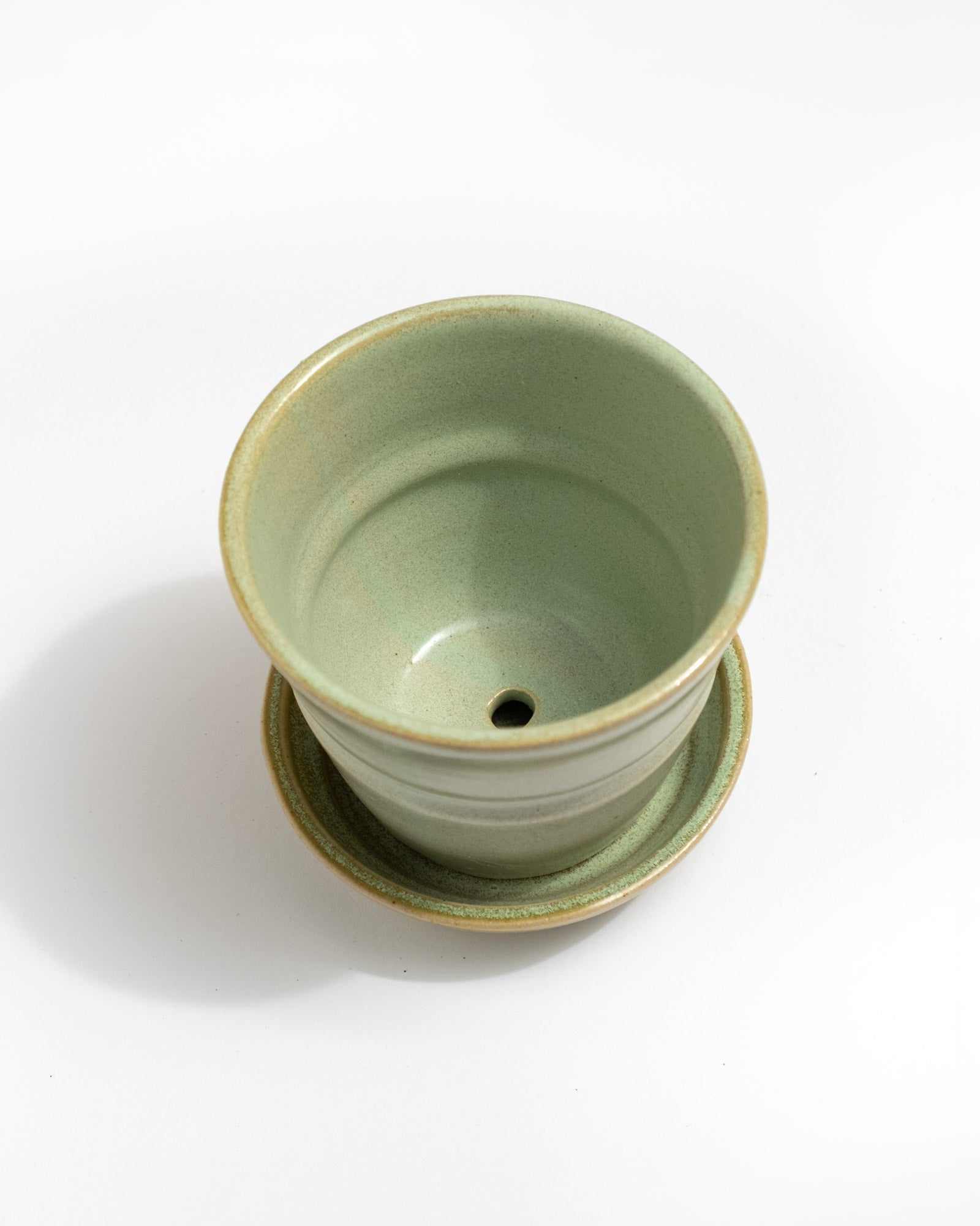 Green ceramic planter with matching saucer, artisan ceramics Italy