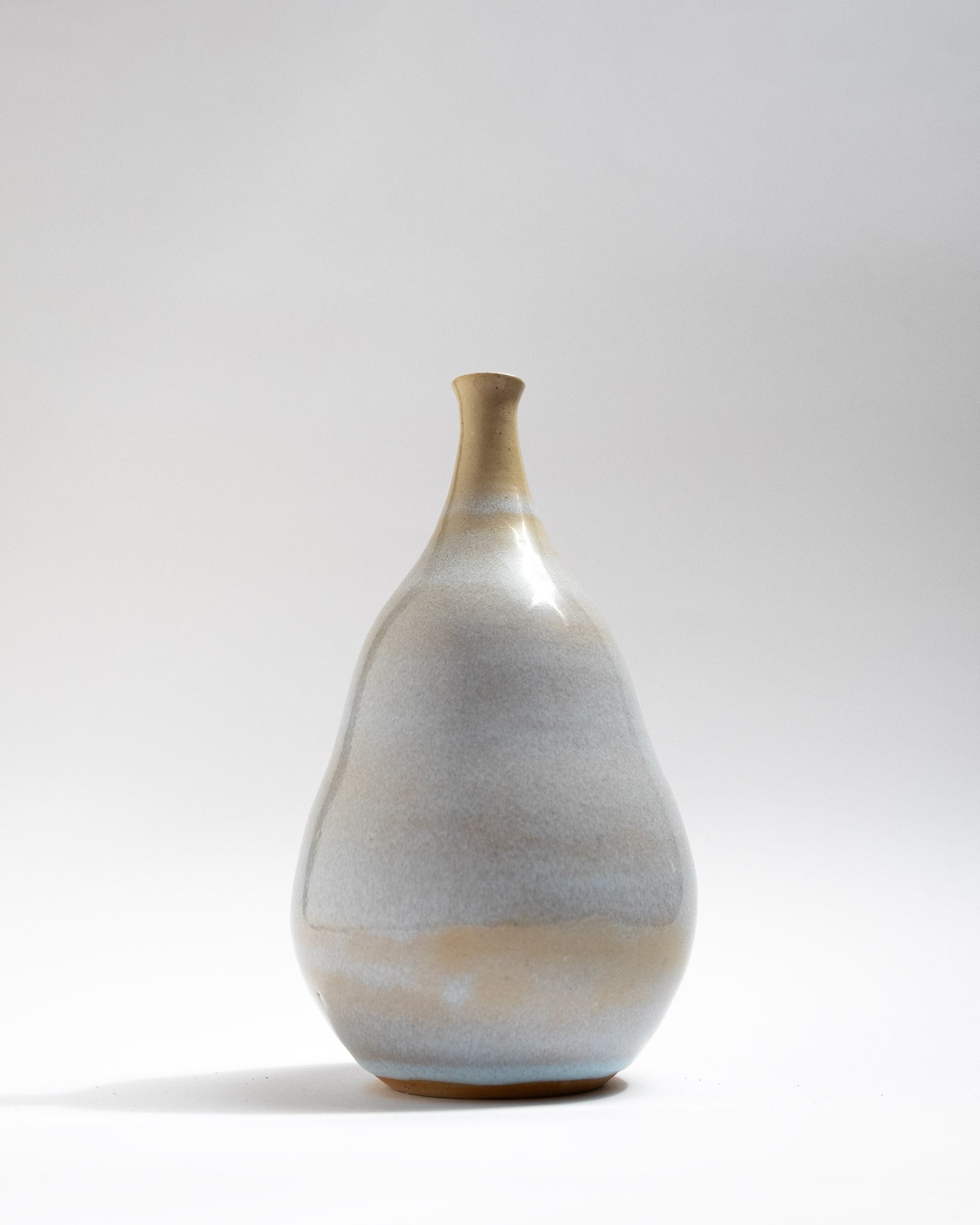 Handmade wheel-thrown stoneware vase with a pear-shaped silhouette and misty grey-beige gradient glaze. Artisan decorative vase by Malfatto Ceramics