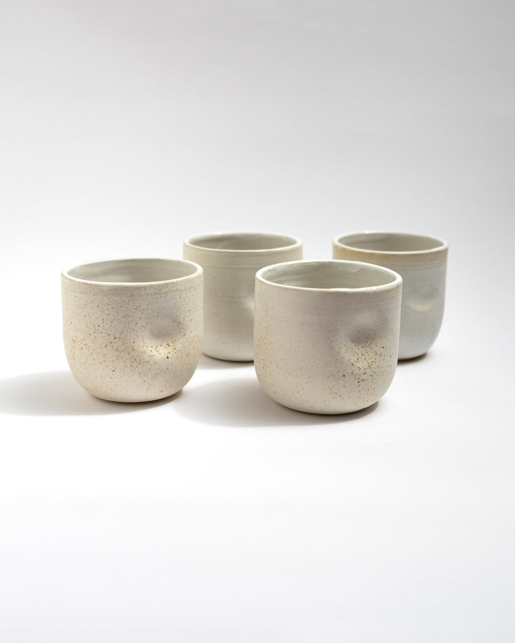 Set of four ceramic speckled cups, handmade in Italy