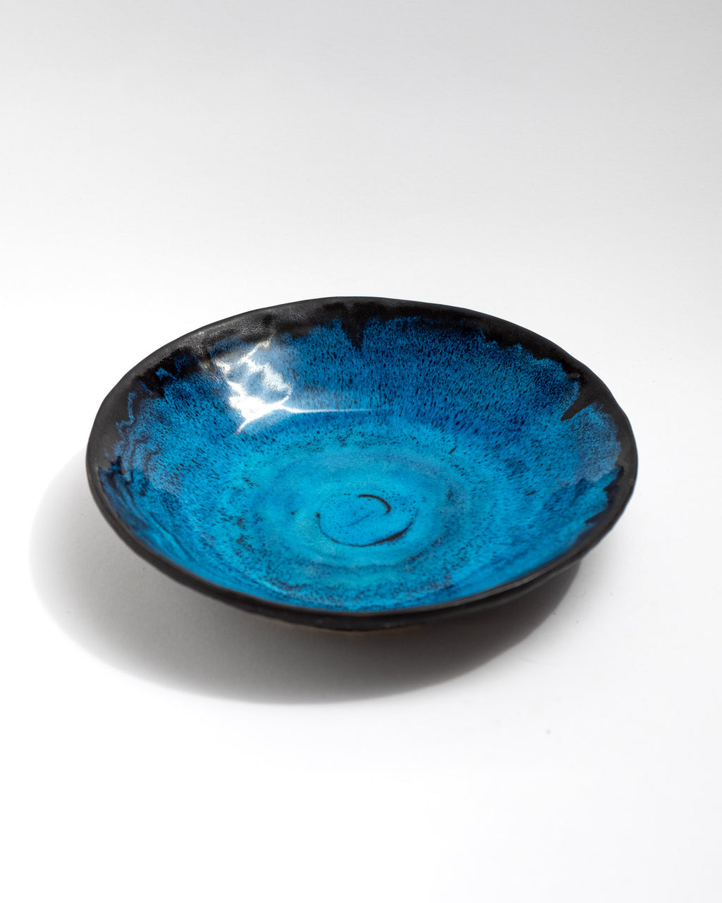 Handmade wheel-thrown blue stoneware bowl with glossy turquoise glaze